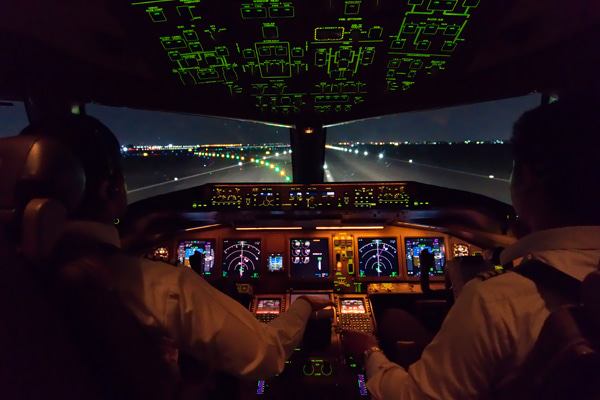Pilots preparing for nighttime takeoff