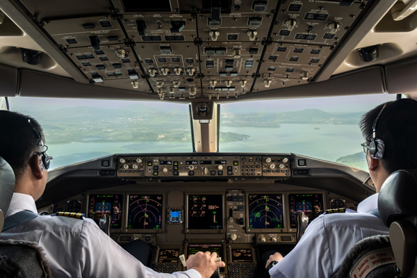 Flight deck with two pilots seated
