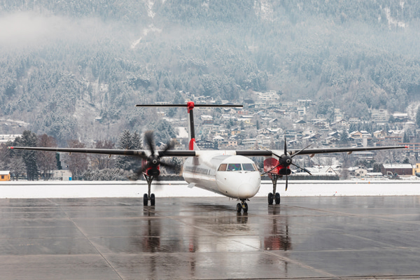 Airplane on snowy airport runway