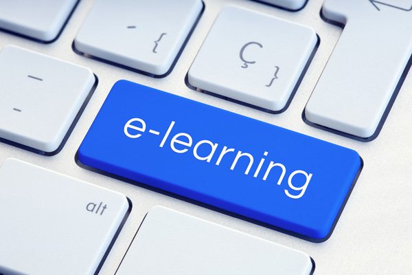 Blue computer key with the word e-learning on it