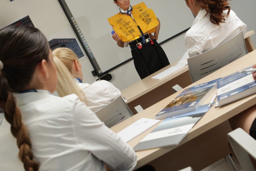 Cabin crew learning life jacket procedures