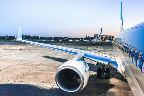 Jet parked on an airport at dawn