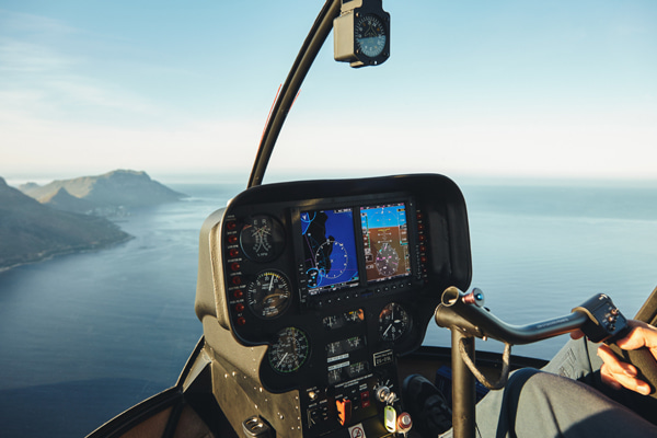 Cockpit interior of a helicopter while flying